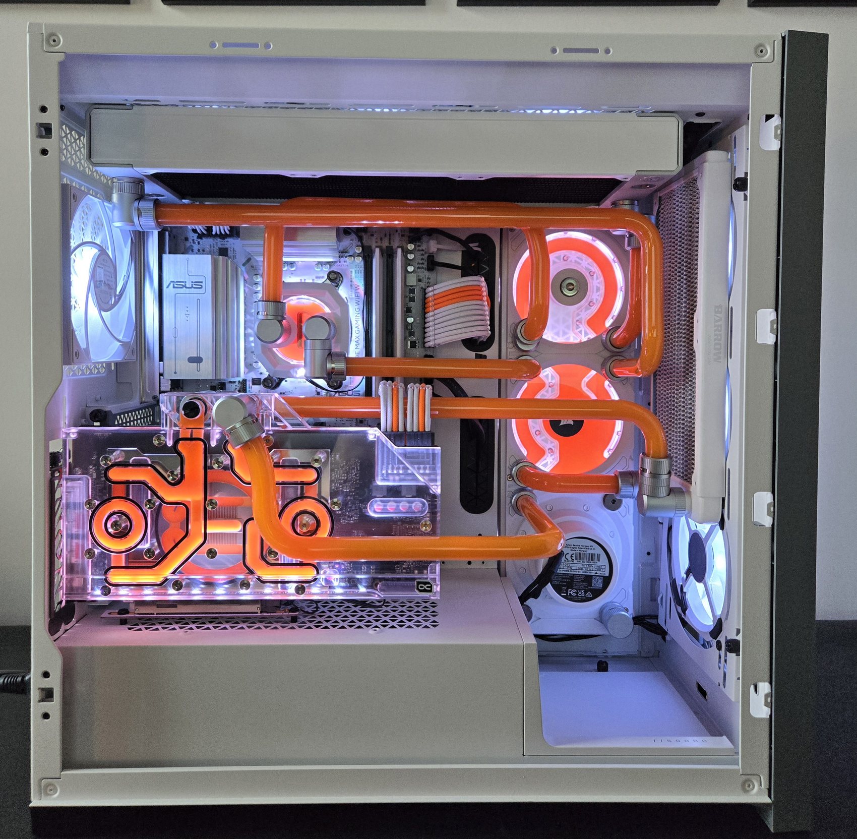 Orange hardline build in a white case, front-on view