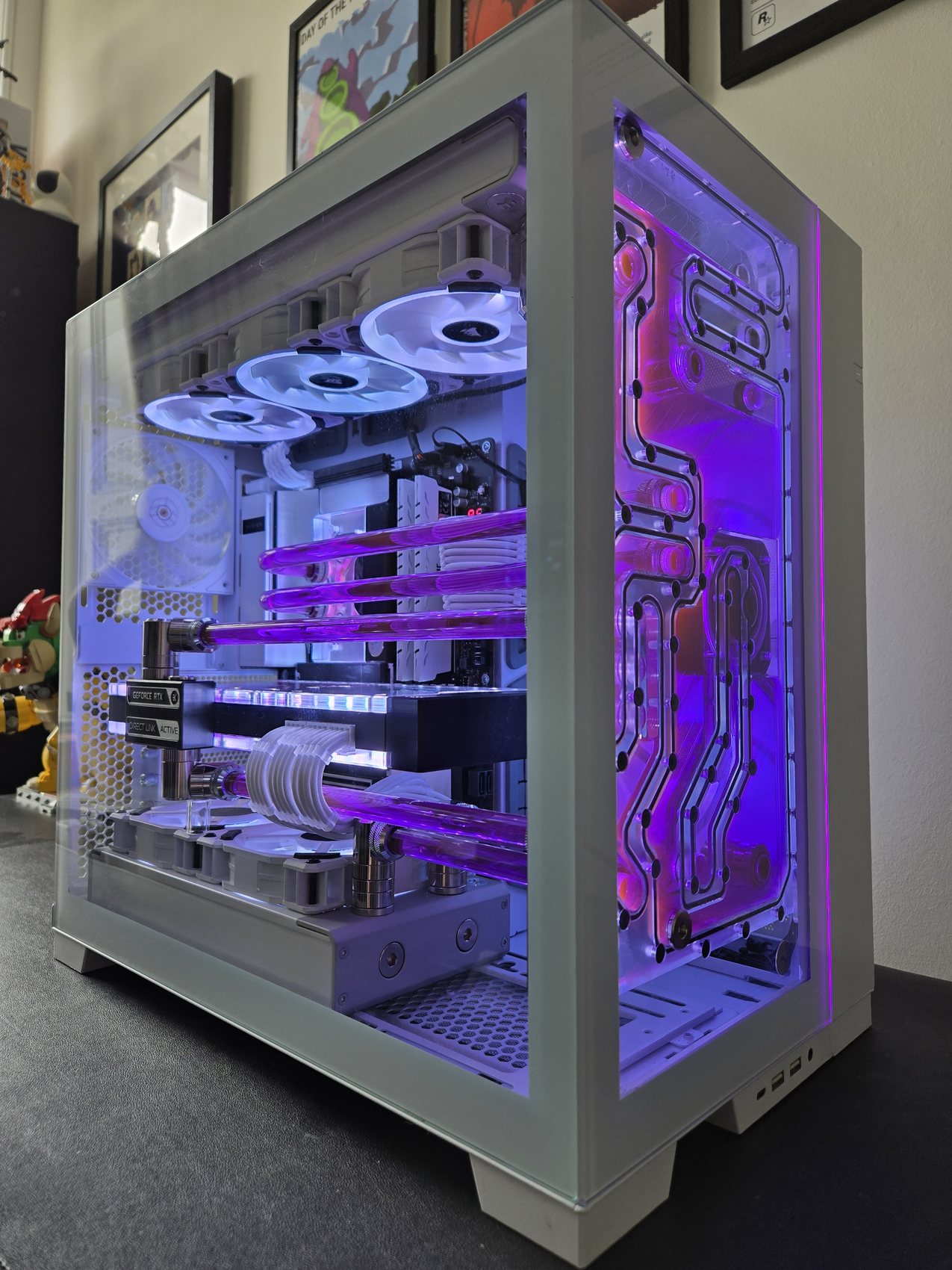 White case custom water-cooled PC with violet hardline tubing, angled view